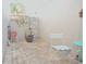 Small, paved patio with seating and potted plants at 5565 Salem Square N Dr, Palm Harbor, FL 34685