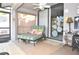 Relaxing screened porch with chaise lounge and tile flooring at 5565 Salem Square N Dr, Palm Harbor, FL 34685