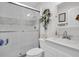 Clean bathroom with shower, toilet and vanity at 5623 80Th N St # 505, St Petersburg, FL 33709