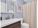 Clean bathroom with white vanity, neutral color palette, and shower/tub combo at 5623 80Th N St # 505, St Petersburg, FL 33709