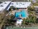 Aerial view of refreshing pool and tennis courts at 5623 80Th N St # 505, St Petersburg, FL 33709