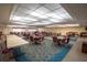 Spacious recreation room with tables and chairs, ideal for social gatherings and community events at 5623 80Th N St # 505, St Petersburg, FL 33709
