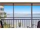 Balcony view overlooking the ocean with patio furniture providing a relaxing outdoor space at 5633 Puerta Del Sol S Blvd # 306, St Petersburg, FL 33715