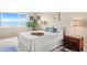 Relaxing bedroom with large window offering stunning views of the bay at 5633 Puerta Del Sol S Blvd # 306, St Petersburg, FL 33715
