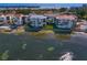 Waterfront condos featuring private balconies, beautiful landscaping, and a swimming pool, all with direct beach access at 5633 Puerta Del Sol S Blvd # 306, St Petersburg, FL 33715