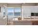 Kitchen featuring granite countertops, modern appliances, and a cozy breakfast nook at 5633 Puerta Del Sol S Blvd # 306, St Petersburg, FL 33715