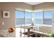 Well lit kitchen with modern granite countertops, stainless appliances, and a cozy breakfast nook with water views at 5633 Puerta Del Sol S Blvd # 306, St Petersburg, FL 33715