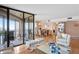 This well lit living room flows into the dining room and offers access to a waterfront balcony at 5633 Puerta Del Sol S Blvd # 306, St Petersburg, FL 33715