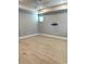 Large bonus room with hardwood floors and pre-wired for TV at 6035 Plover Meadow St, Lithia, FL 33547
