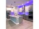 Modern kitchen with stainless steel appliances and an island at 6035 Plover Meadow St, Lithia, FL 33547