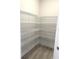 Walk-in pantry with wire shelving for optimal organization and storage solutions at 6035 Plover Meadow St, Lithia, FL 33547