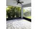 Spacious screened porch with brick pavers at 6035 Plover Meadow St, Lithia, FL 33547