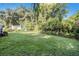 Large backyard with a grassy lawn at 7202 N 21St St, Tampa, FL 33610