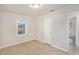 Bedroom with tile floor, window, and closet at 7202 N 21St St, Tampa, FL 33610
