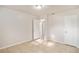 Simple bedroom with tile floors and a closet at 7202 N 21St St, Tampa, FL 33610