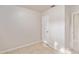 Simple bedroom with tile floors and a large closet at 7202 N 21St St, Tampa, FL 33610