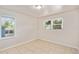 Spacious bedroom with tile floors and large windows at 7202 N 21St St, Tampa, FL 33610