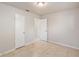 Spacious bedroom with tile floors and access to bathroom at 7202 N 21St St, Tampa, FL 33610