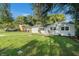 Newly renovated house with a large grassy yard at 7202 N 21St St, Tampa, FL 33610
