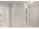 Clean hallway with access to bedrooms and bathroom at 7202 N 21St St, Tampa, FL 33610