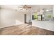 Modern kitchen with white cabinets and a breakfast bar at 7202 N 21St St, Tampa, FL 33610
