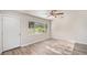 Bright living room with hardwood floors and lots of natural light at 7202 N 21St St, Tampa, FL 33610