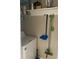 Laundry room with washer, shelving, and cleaning supplies at 8615 Mallard Reserve Dr # 102, Tampa, FL 33614