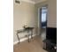 Living room with TV and access to bedroom at 8615 Mallard Reserve Dr # 102, Tampa, FL 33614