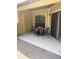 Private patio with table and chairs at 8615 Mallard Reserve Dr # 102, Tampa, FL 33614