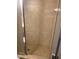 Shower stall with tiled walls at 8615 Mallard Reserve Dr # 102, Tampa, FL 33614