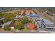 Aerial perspective of property surrounded by businesses and homes at 931 And 925 Florida Ave, Palm Harbor, FL 34683