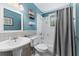 Clean bathroom with walk-in shower and pedestal sink at 931 And 925 Florida Ave, Palm Harbor, FL 34683