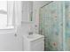 Clean bathroom with a shower/tub combo and white vanity at 931 And 925 Florida Ave, Palm Harbor, FL 34683