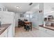 White kitchen features ample counter space and a breakfast nook at 931 And 925 Florida Ave, Palm Harbor, FL 34683