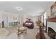 Spacious living room boasts a fireplace and ample seating at 931 And 925 Florida Ave, Palm Harbor, FL 34683