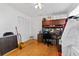 Home office with built in desk and hardwood floors at 931 And 925 Florida Ave, Palm Harbor, FL 34683