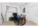 Home office with desk, chairs, and large window at 931 And 925 Florida Ave, Palm Harbor, FL 34683