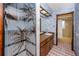 Bathroom with double vanity, shower, and tiled flooring at 947 Sousa Dr, Largo, FL 33771