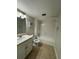 Clean bathroom with a shower/tub combo and white vanity at 107 S Obrien St # 220, Tampa, FL 33609