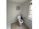 Clean bathroom with toilet and neutral color scheme at 107 S Obrien St # 220, Tampa, FL 33609