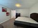 Bright bedroom with a king-size bed and ample space at 107 S Obrien St # 220, Tampa, FL 33609