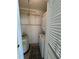 Compact laundry closet with stackable washer and dryer at 107 S Obrien St # 220, Tampa, FL 33609