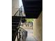 Exterior metal staircase leading to a courtyard at 107 S Obrien St # 220, Tampa, FL 33609