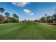 Expansive view of the golf course, showcasing meticulously maintained greens and lush landscaping at 113 Lindsay Ln # 23, Oldsmar, FL 34677