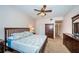 Spacious bedroom featuring a large bed, ceiling fan, and ample closet space at 113 Lindsay Ln # 23, Oldsmar, FL 34677