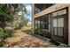 Enclosed patio with large glass windows offering golf course views and ample natural light at 113 Lindsay Ln # 23, Oldsmar, FL 34677