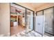 View from a patio overlooking the kitchen and dining area, enhancing indoor-outdoor living at 113 Lindsay Ln # 23, Oldsmar, FL 34677