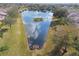 Arial view of a canal and surrounding houses at 11575 Captiva Kay Dr, Riverview, FL 33569