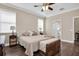 Bright bedroom offers lots of natural light from window and ceiling fan at 12099 Gavin Ln, Odessa, FL 33556