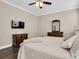 Bedroom featuring a ceiling fan and a spacious layout at 12099 Gavin Ln, Odessa, FL 33556